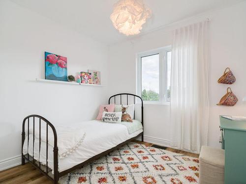 23 Carnation Ave, Toronto, ON - Indoor Photo Showing Bedroom