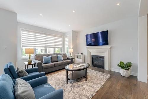 290 Wisteria Way, Oakville, ON - Indoor Photo Showing Living Room With Fireplace