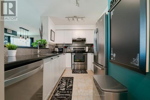 Ph 308 - 1 Lee Centre Drive, Toronto, ON - Indoor Photo Showing Kitchen With Stainless Steel Kitchen