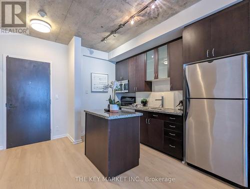 506 - 1 Shaw Street, Toronto, ON - Indoor Photo Showing Kitchen