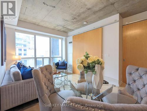 506 - 1 Shaw Street, Toronto, ON - Indoor Photo Showing Living Room