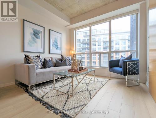 506 - 1 Shaw Street, Toronto, ON - Indoor Photo Showing Living Room