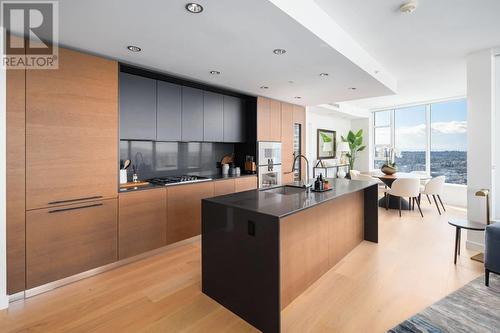 4X10 1289 Hornby Street, Vancouver, BC - Indoor Photo Showing Kitchen With Double Sink