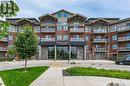 414 - 35 Kingsbury Square, Guelph (Pine Ridge), ON  - Outdoor With Balcony With Facade 