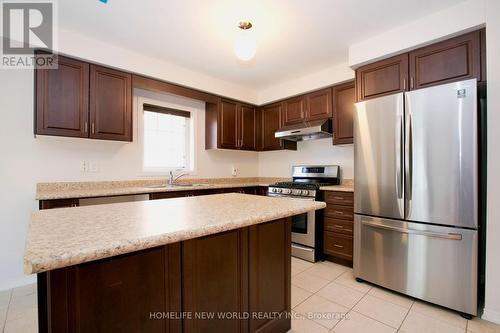 16 Eastern Skies Way, Markham (Wismer), ON - Indoor Photo Showing Kitchen With Double Sink