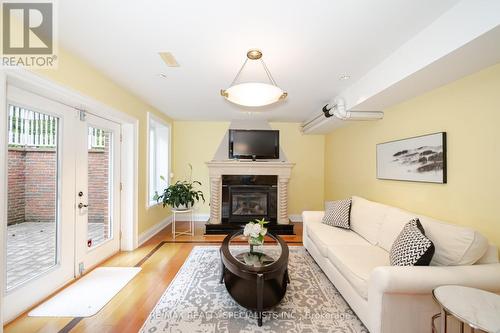 174 Burnhamthorpe Road, Toronto, ON - Indoor Photo Showing Living Room With Fireplace