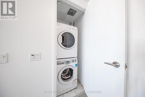 702 - 181 Dundas Street E, Toronto, ON - Indoor Photo Showing Laundry Room