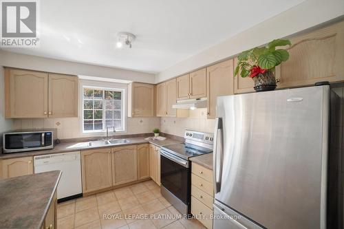 48 - 9800 Mclaughlin Road, Brampton, ON - Indoor Photo Showing Kitchen With Double Sink
