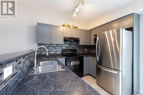 411 - 1830 Walker'S Line, Burlington, ON - Indoor Photo Showing Kitchen With Stainless Steel Kitchen With Double Sink