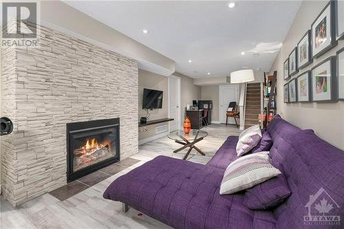 108 Watchhorn Grove, Ottawa, ON - Indoor Photo Showing Living Room With Fireplace
