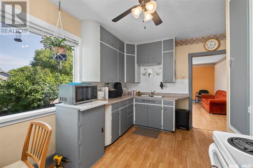 213 10Th Street E, Prince Albert, SK - Indoor Photo Showing Kitchen With Double Sink