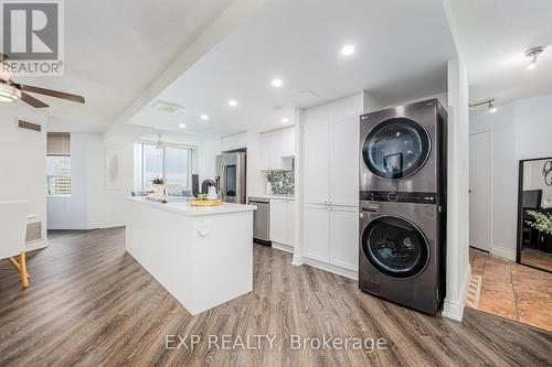 1406 - 3650 Kaneff Crescent, Mississauga, ON - Indoor Photo Showing Laundry Room
