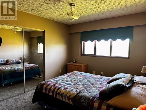 4591 216 Road, Dawson Creek, BC - Indoor Photo Showing Bedroom