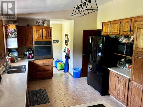 4591 216 Road, Dawson Creek, BC - Indoor Photo Showing Kitchen With Double Sink