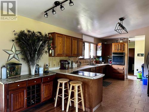 4591 216 Road, Dawson Creek, BC - Indoor Photo Showing Kitchen With Double Sink