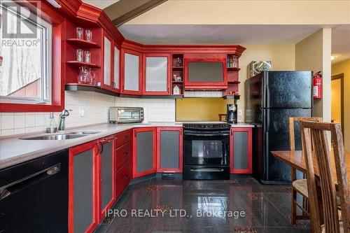 9 Raven Hill Drive, Tiny, ON - Indoor Photo Showing Kitchen With Double Sink