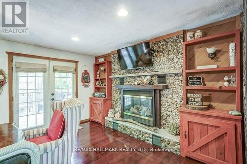 6 Elm Lane, Tiny, ON - Indoor Photo Showing Other Room With Fireplace