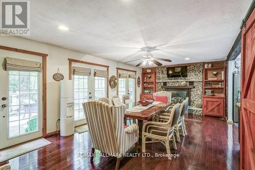 6 Elm Lane, Tiny, ON - Indoor With Fireplace