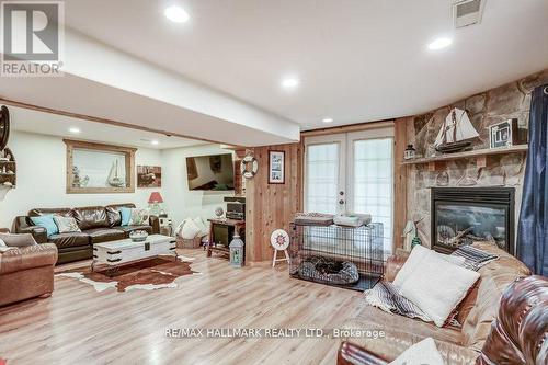 6 Elm Lane, Tiny, ON - Indoor Photo Showing Living Room With Fireplace