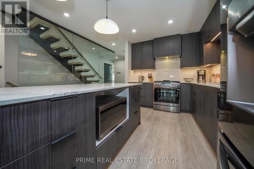 12 Warwick Avenue, Lambton Shores (Grand Bend), ON - Indoor Photo Showing Kitchen With Upgraded Kitchen