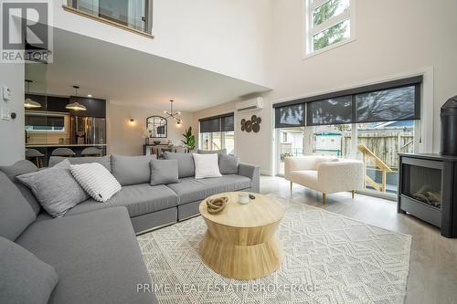 12 Warwick Avenue, Lambton Shores (Grand Bend), ON - Indoor Photo Showing Living Room With Fireplace