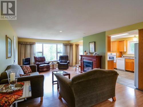 361 Rau Road, Quesnel, BC - Indoor Photo Showing Living Room With Fireplace