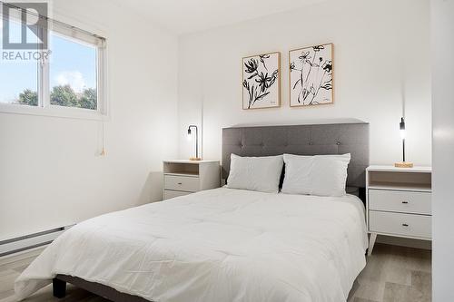 2009/2011 Richter Street, Kelowna, BC - Indoor Photo Showing Bedroom