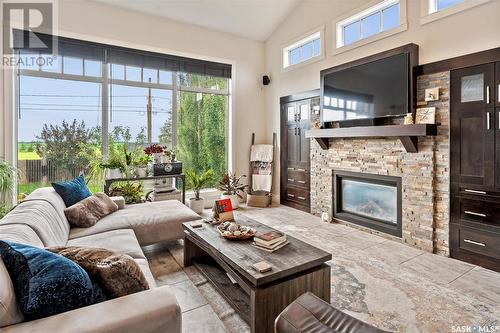 618 Cedar Avenue, Dalmeny, SK - Indoor Photo Showing Living Room With Fireplace