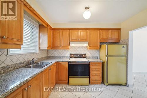 32 Killamarsh Drive, Toronto, ON - Indoor Photo Showing Kitchen With Double Sink