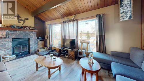 5475 Scuffi Road, 100 Mile House, BC - Indoor Photo Showing Living Room With Fireplace