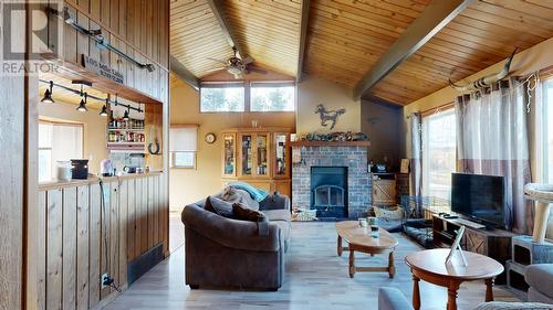 5475 Scuffi Road, 100 Mile House, BC - Indoor Photo Showing Living Room With Fireplace