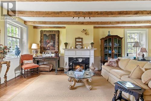 2491 County Rd 64, Prince Edward County (Ameliasburgh), ON - Indoor Photo Showing Living Room With Fireplace