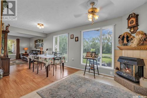 Imperial Acreage Highway#2, Imperial, SK - Indoor Photo Showing Dining Room With Fireplace