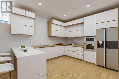 virtually finished lower kitchen - 148 Foxborough Place, Thames Centre (Thorndale), ON - Indoor Photo Showing Kitchen