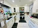 79 - 125 Shaughnessy Boulevard, Toronto, ON  - Indoor Photo Showing Kitchen With Double Sink 