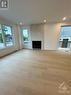1354 Louis Lane Unit#A, Ottawa, ON  - Indoor With Fireplace 