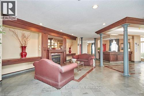 330 - 8111 Forest Glen Drive, Niagara Falls, ON - Indoor With Fireplace
