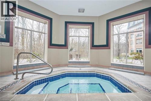 330 - 8111 Forest Glen Drive, Niagara Falls, ON - Indoor Photo Showing Other Room With In Ground Pool