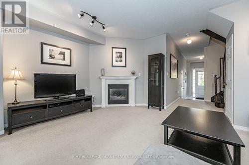 2041 Fiddlers Way, Oakville, ON - Indoor Photo Showing Living Room With Fireplace