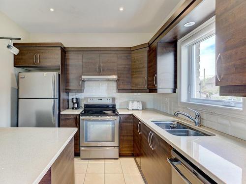 Cuisine - 4831 Rue Du Palomino, Montréal (Pierrefonds-Roxboro), QC - Indoor Photo Showing Kitchen With Double Sink