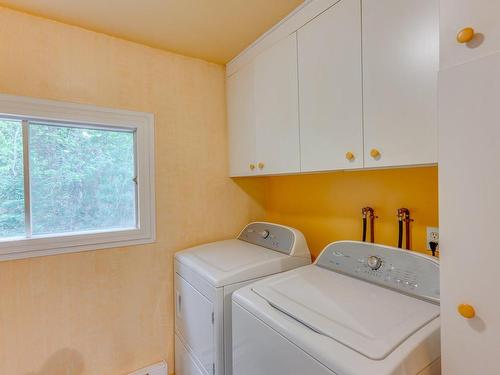 Salle de lavage - 206 Av. Des Sables, Saint-Paul, QC - Indoor Photo Showing Laundry Room
