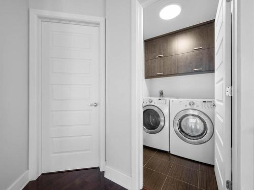 Salle de lavage - 12-270 Rue Anne-Hébert, Saint-Basile-Le-Grand, QC - Indoor Photo Showing Laundry Room