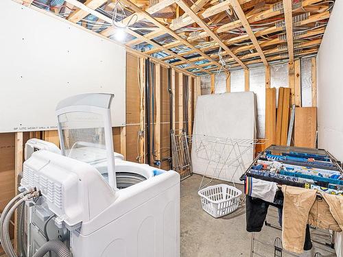 Salle de lavage - 108 Rue De Verchères, Dunham, QC - Indoor Photo Showing Basement