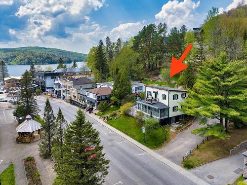 Overall view - 1926 Ch. Du Village, Mont-Tremblant, QC - Outdoor With Body Of Water With View