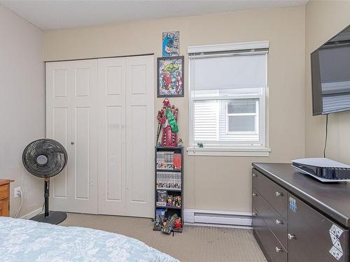 101-2153 Ridgemont Pl, Nanaimo, BC - Indoor Photo Showing Bedroom