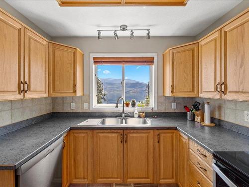 6559 Sherburn Road, Peachland, BC - Indoor Photo Showing Kitchen With Double Sink