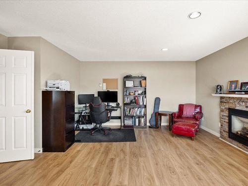 6559 Sherburn Road, Peachland, BC - Indoor Photo Showing Other Room With Fireplace