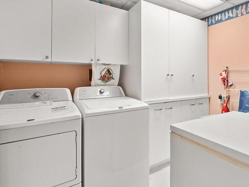 101-1940 Richter Street, Kelowna, BC - Indoor Photo Showing Laundry Room