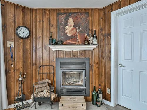 Living room - 305 Ch. Des Habitations-Des-Monts, Saint-Sauveur, QC - Indoor With Fireplace