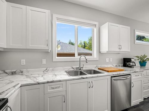 2612 Swanson St, Courtenay, BC - Indoor Photo Showing Kitchen With Double Sink